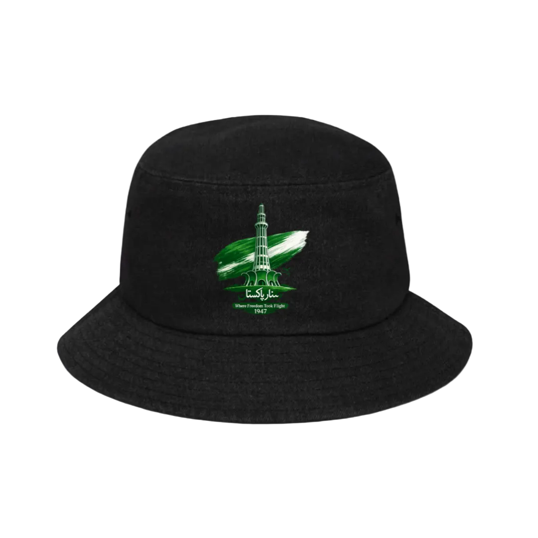 A black bucket hat with a green and white graphic of a rocket and the text 'Masha'Allah with the help of Allah 1963' on the front, set against a solid light green background.