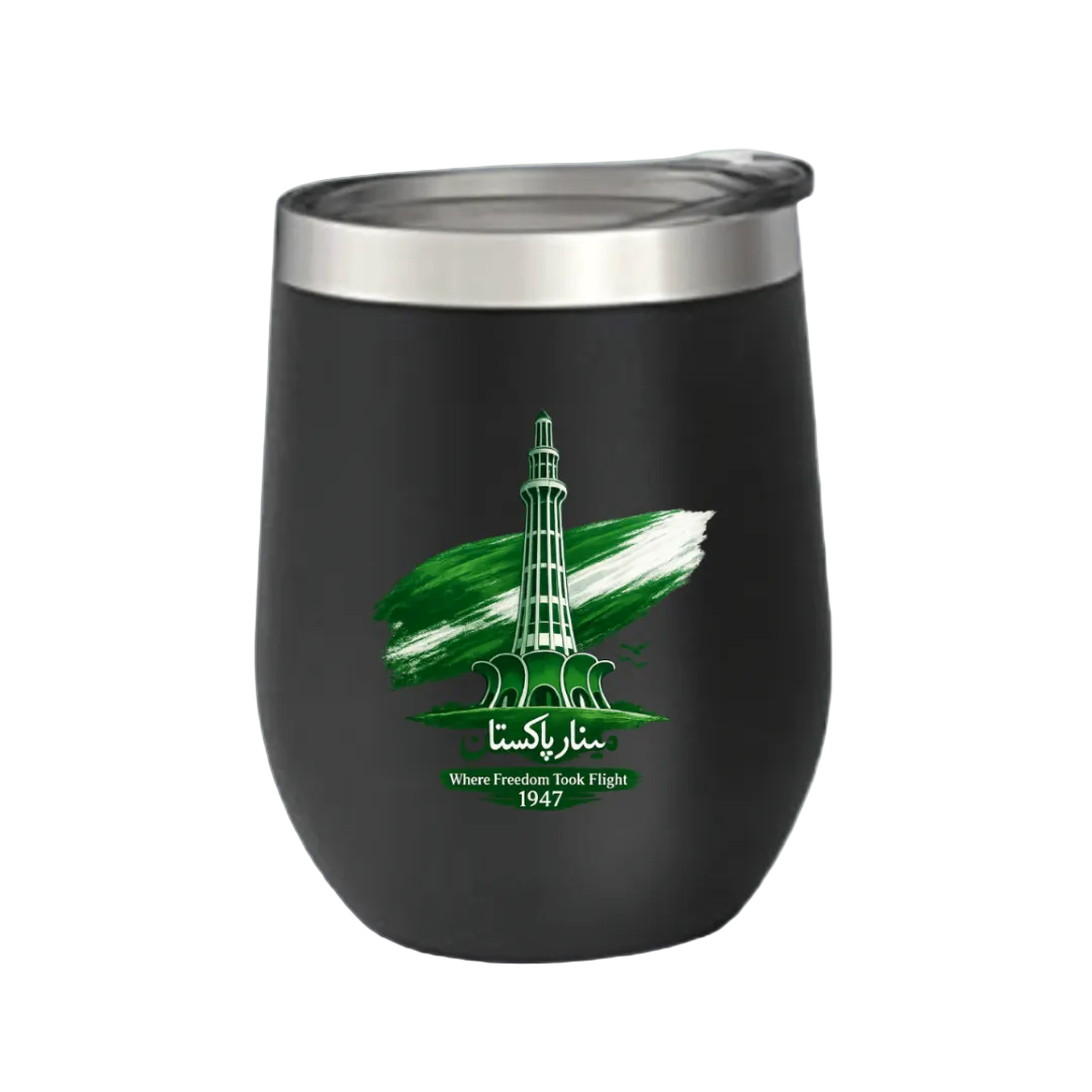 A black stemless wine tumbler with a silver stainless steel rim, featuring a green and white graphic of the Bagram Air Force Base tower with the text 'Bagram Kasta' and 'Where Freedom Took Flight 1947' on a light green background.
