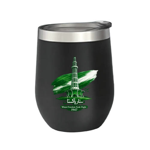 A black stemless wine tumbler with a silver stainless steel rim, featuring a green and white graphic of the Bagram Air Force Base tower with the text 'Bagram Kasta' and 'Where Freedom Took Flight 1947' on a light green background.
