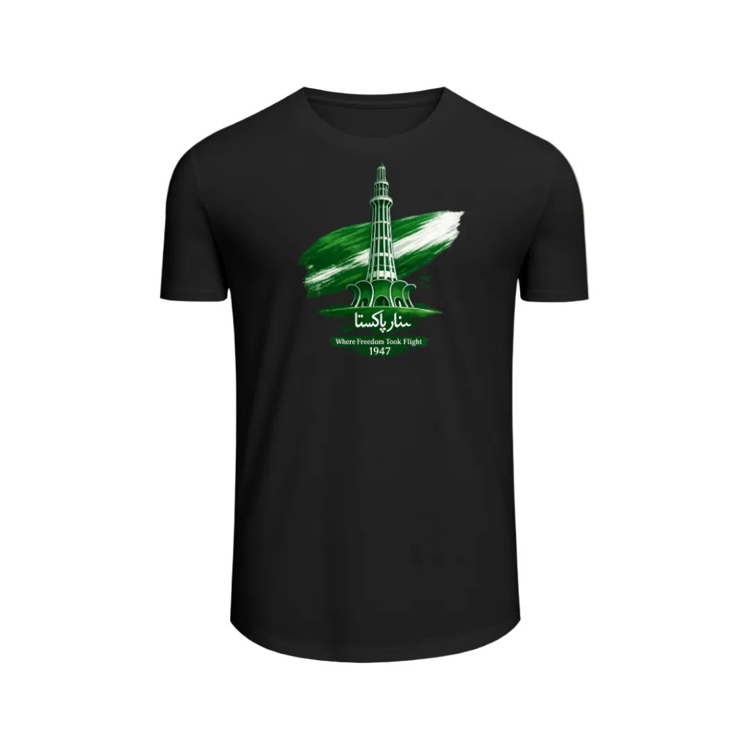 A black short-sleeve t-shirt with a green and white graphic of a tower and the text 'Lahore Jan' and 'Where Freedom Fly Flight 7647' on the chest, displayed against a light green gradient background.