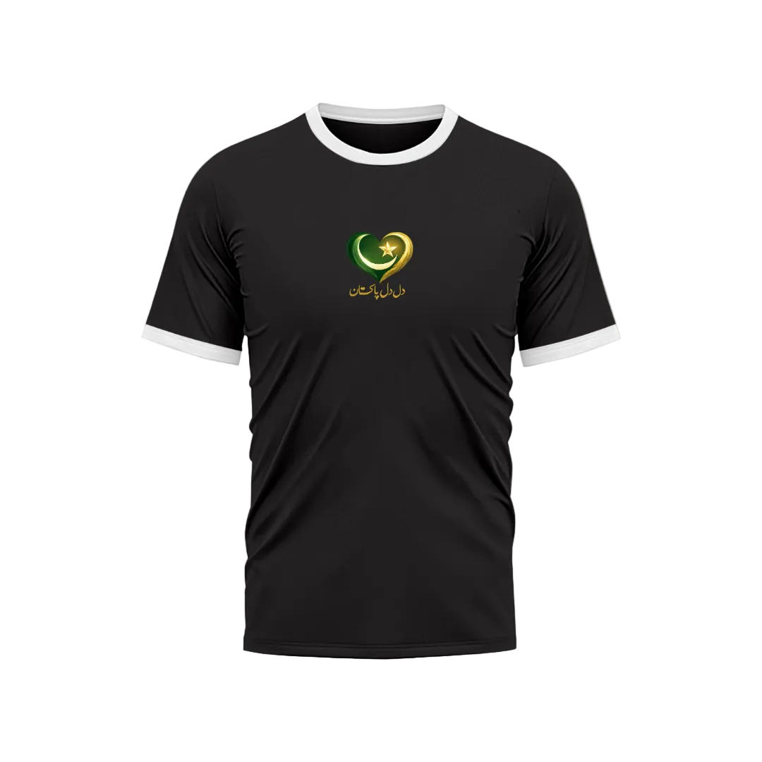 A black ringer t-shirt with white trim on the collar and sleeves, featuring a green and gold heart-shaped graphic with Arabic calligraphy on the chest, set against a light green gradient background.