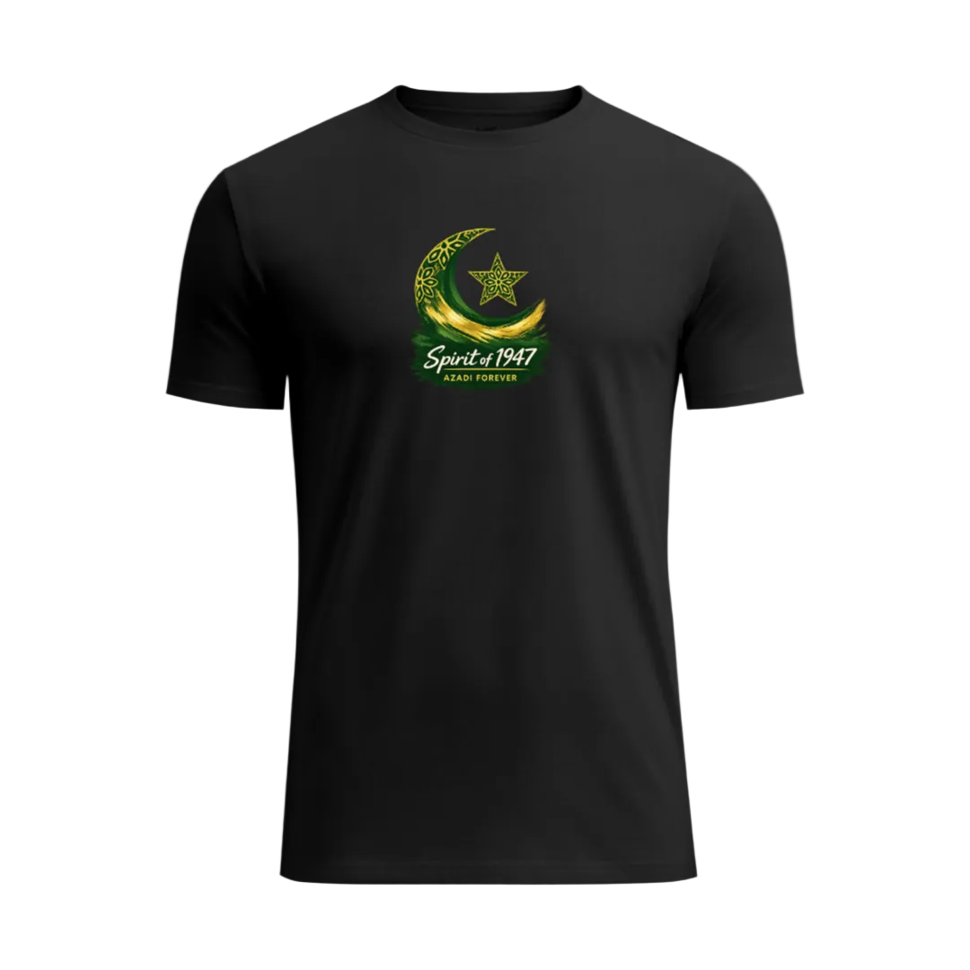 A black short-sleeve crewneck t-shirt featuring a green and gold crescent moon and star graphic on the chest with the text 'Spirit of 1947 ENDLESS FOREVER', displayed against a light green gradient background.