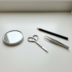 Orial eyebrow scissors flat lay with beauty tools on vanity