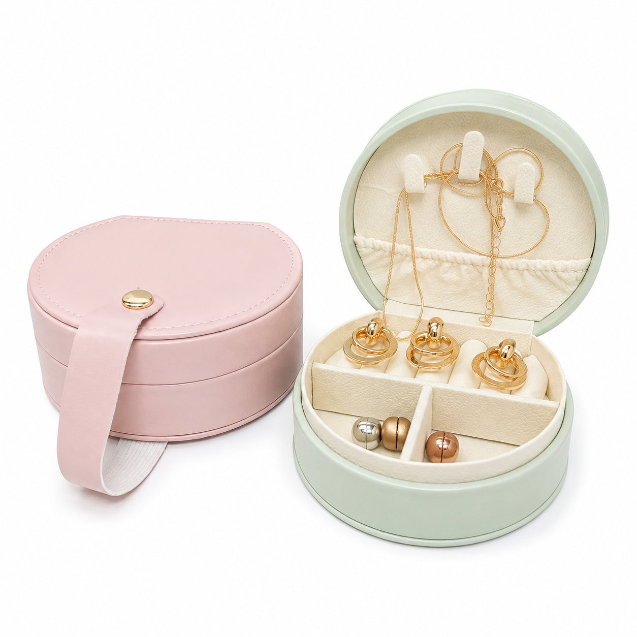 A round jewelry box shown open and closed on a white background. The closed box is light pink with a strap and snap closure.
